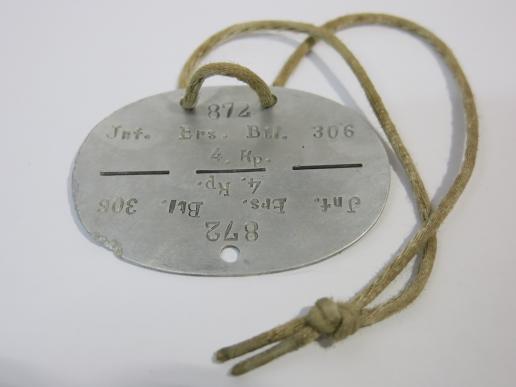 German Wehrmacht ID Tag 872 Jnf. Ers. Btl. 306 4. Kp. With Cord. (3)
