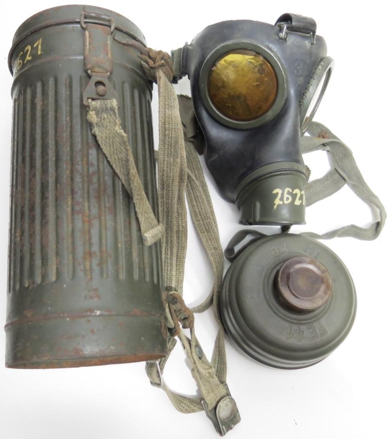 German Wehrmacht Combat GM38 Black Rubber Gas Mask Set 1942/43 Named And Numbered For Rtr. Taschke 2621, Smooth End/Not Rolled Edge Can Variation.